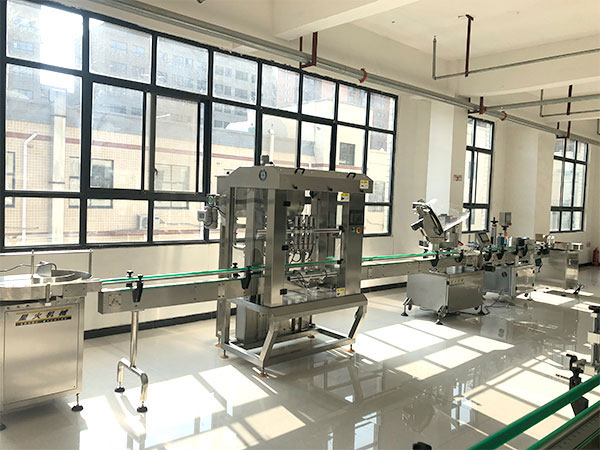 長(zhǎng)沙包裝機(jī)械生產(chǎn)廠家四頭醬料灌裝機(jī)